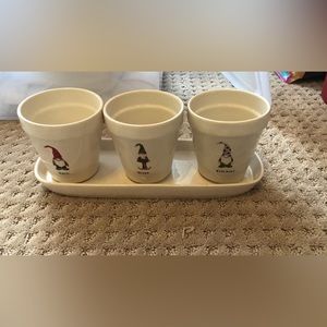 Rae Dunn Christmas Gnomes flower pots.